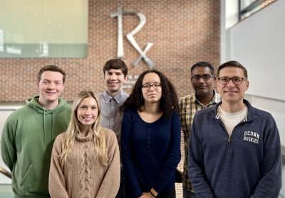 Picture of principal investigator, postdoctoral associate, and graduate and undergraduate students